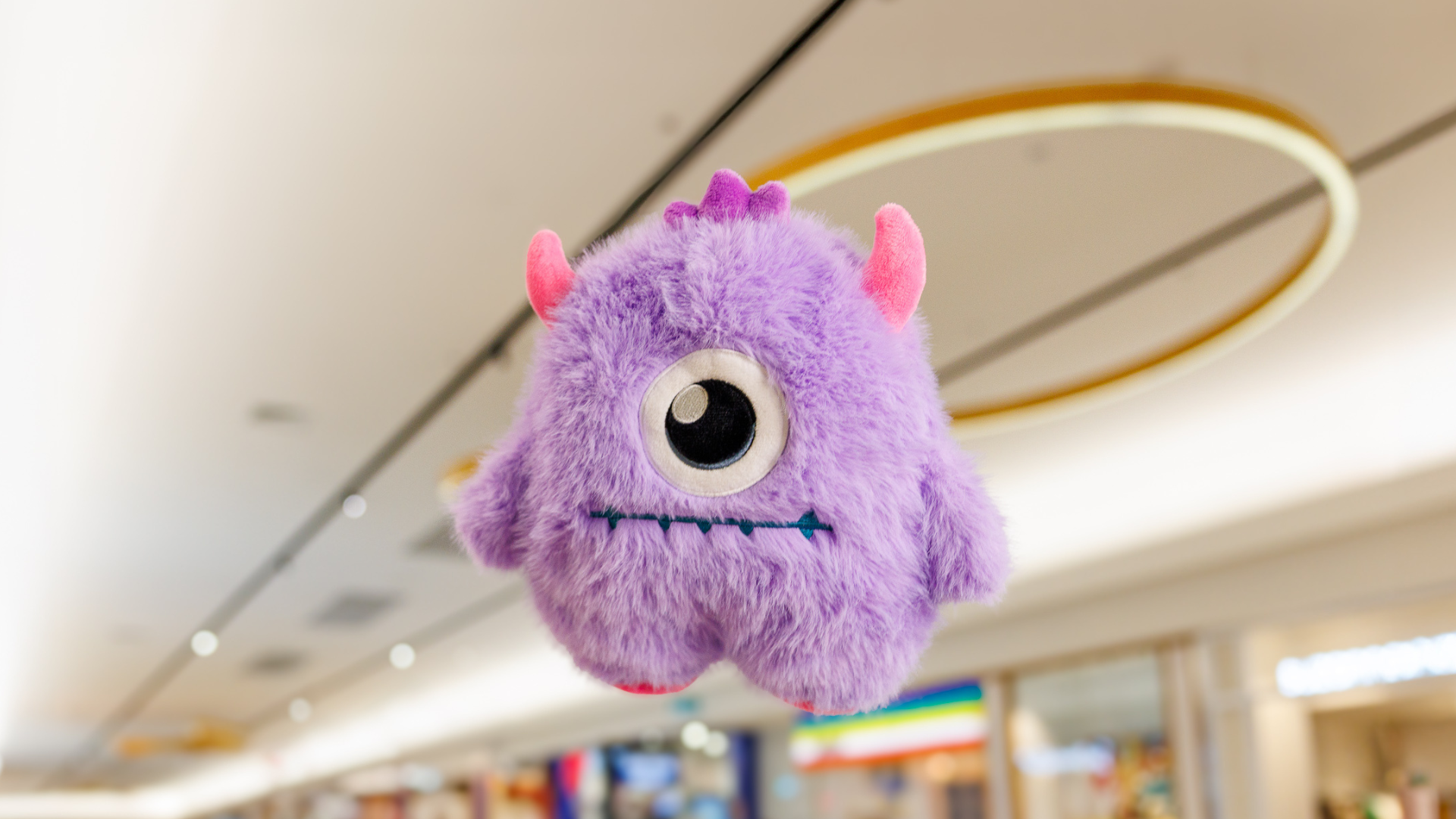 A purple monster floating in the air at The Pines Elanora.