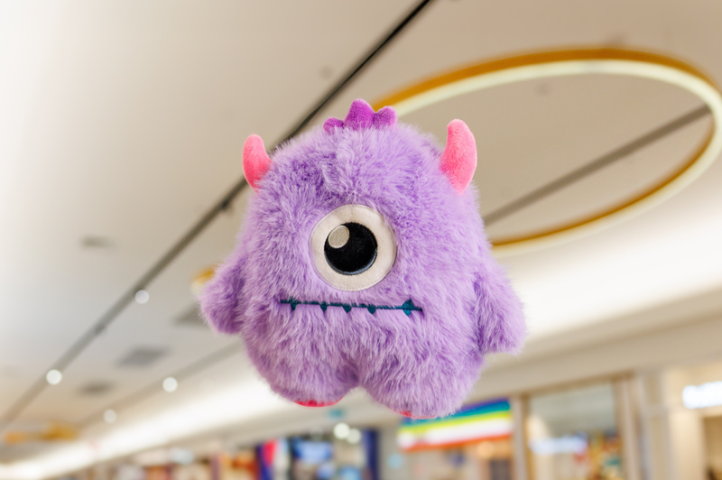 A purple monster floating in the air at The Pines Elanora.